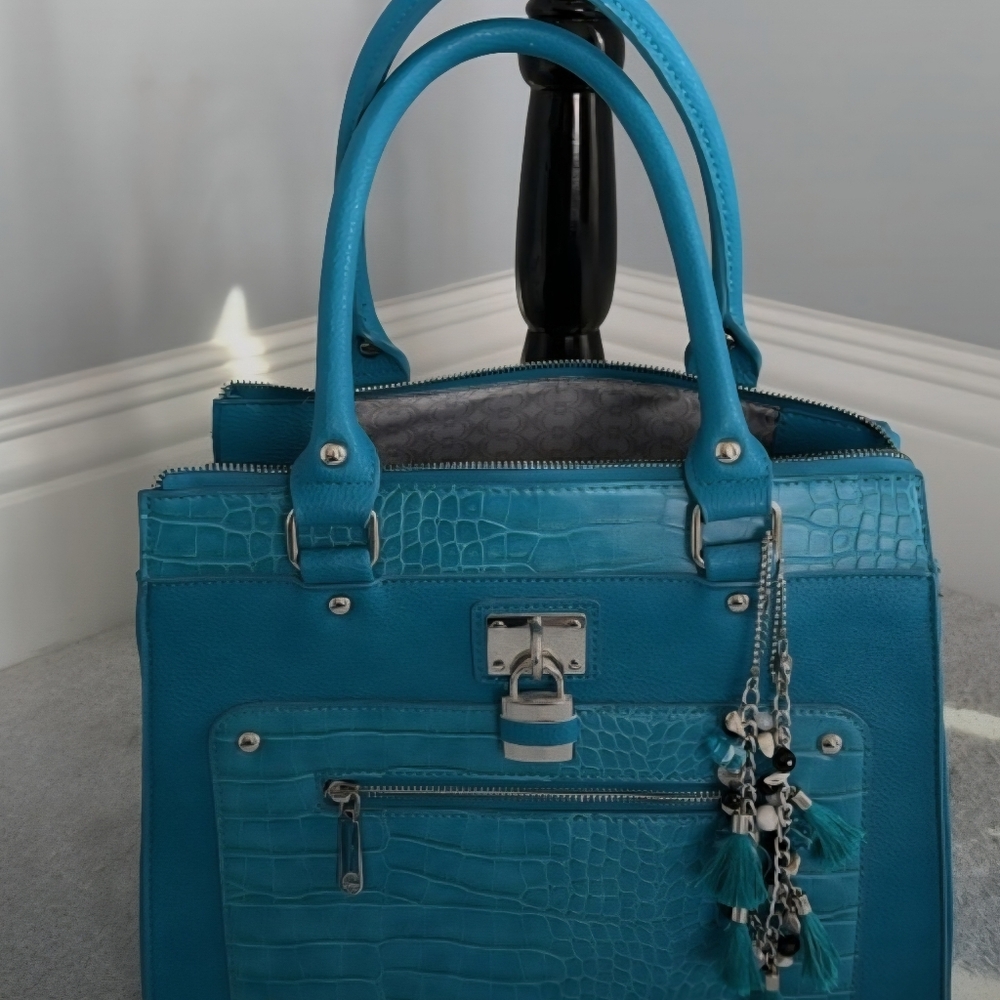 Charming Charlie teal blue collection. Handbag, scarf and necklace.